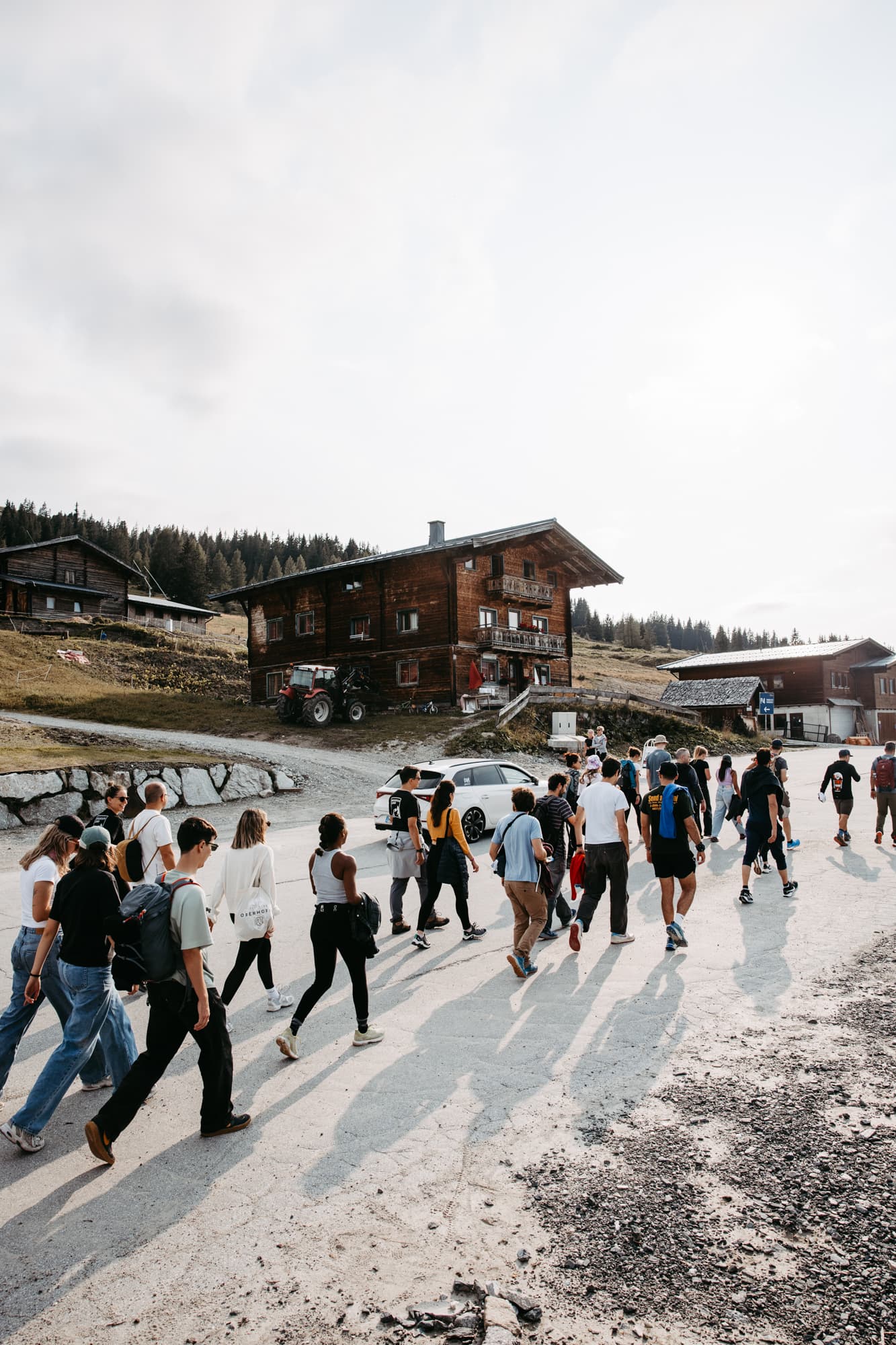 Trailrunning camp Austria - Mountain camp participants walking together in Alpine village Hochkrimml